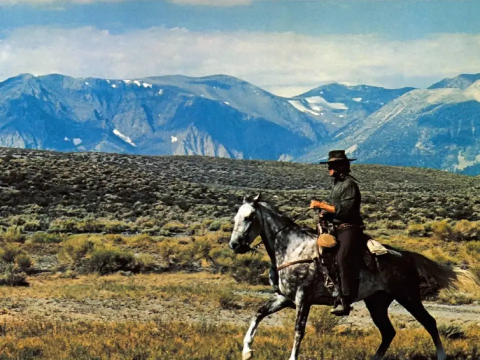On the Set of "High Plains Drifter" (1973): This image captures Clint Eastwood during the filming of "High Plains Drifter," showcasing him in character as the enigmatic stranger.